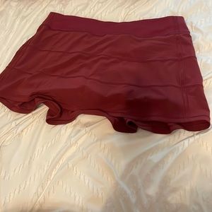 Size 12 maroon lululemon tennis skirt